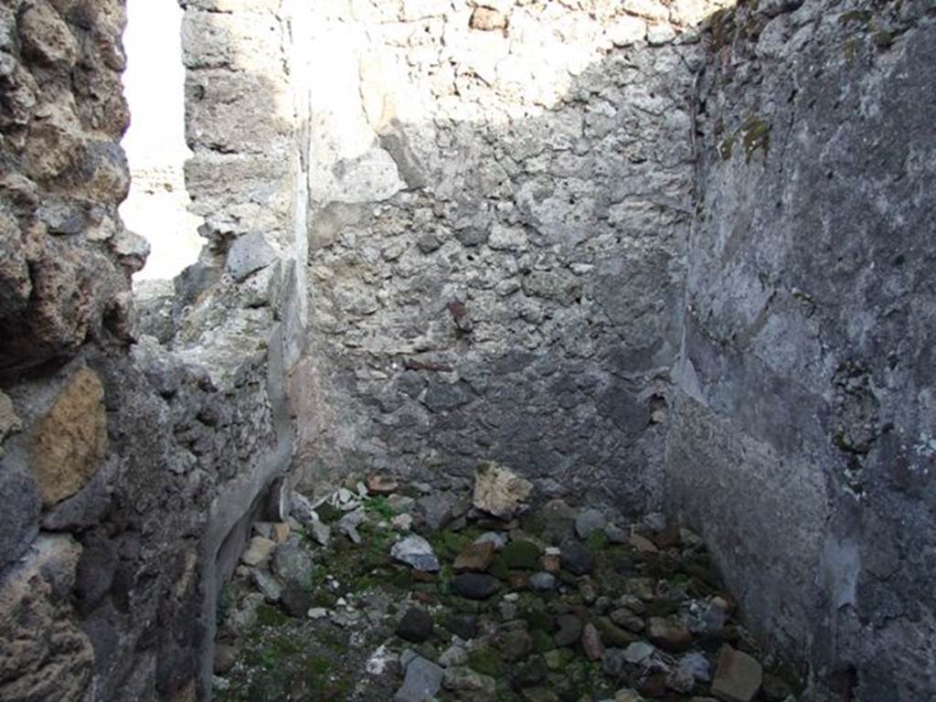 VIII.5.21 Pompeii. December 2007.
Small room, probably including stairs and with latrine below them, at the end of the corridor on south side. Looking east.