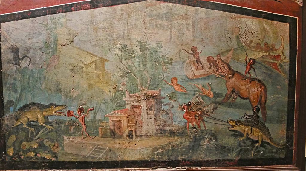 VIII.5.24 Pompeii. 2016/2017.
Wall painting of Pygmies in a Nile Scene. Found 1882, from a low wall connecting peristyle columns in VIII.5.24.
Now in Naples Archaeological Museum. Inventory number 113195. Photo courtesy of Giuseppe Ciaramella.