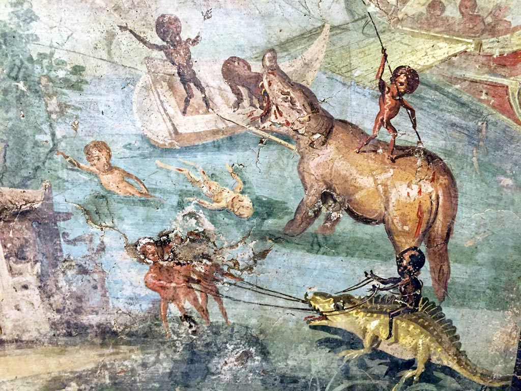 VIII.5.24 Pompeii.
Detail from a wall painting of Pygmies in a Nile Scene. Found in 1882 from a low wall connecting peristyle columns in VIII.5.24.
Now in Naples Archaeological Museum. Inventory number 113195.
Photo courtesy of Giuseppe Ciaramella taken December 2019.