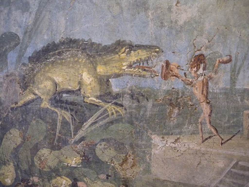 VIII.5.24 Pompeii. Detail from a wall painting of Pygmies in a Nile Scene. From a low wall connecting peristyle columns in VIII.5.24.
Now in Naples Archaeological Museum. Inventory number 113195.