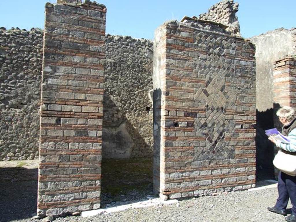 VIII.5.28 Pompeii. March 2009. Doorway to Room 7, Oecus.