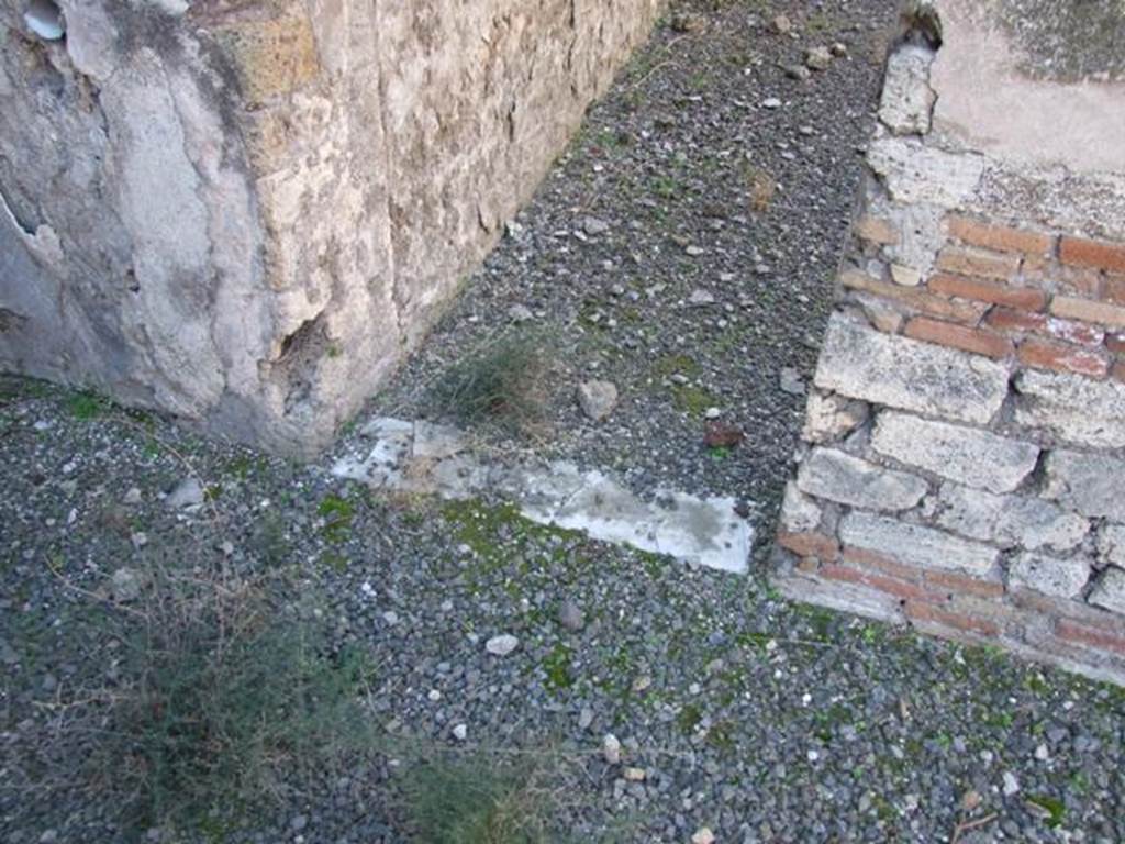 VIII.5.28 Pompeii. March 2009. Sill of small doorway to Room 11.