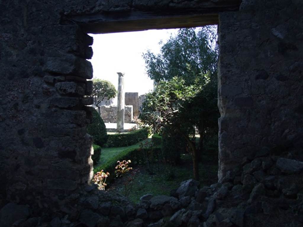 VIII.5.28 Pompeii. March 2009. Room 12, Oecus. East wall, with window overlooking Garden area.