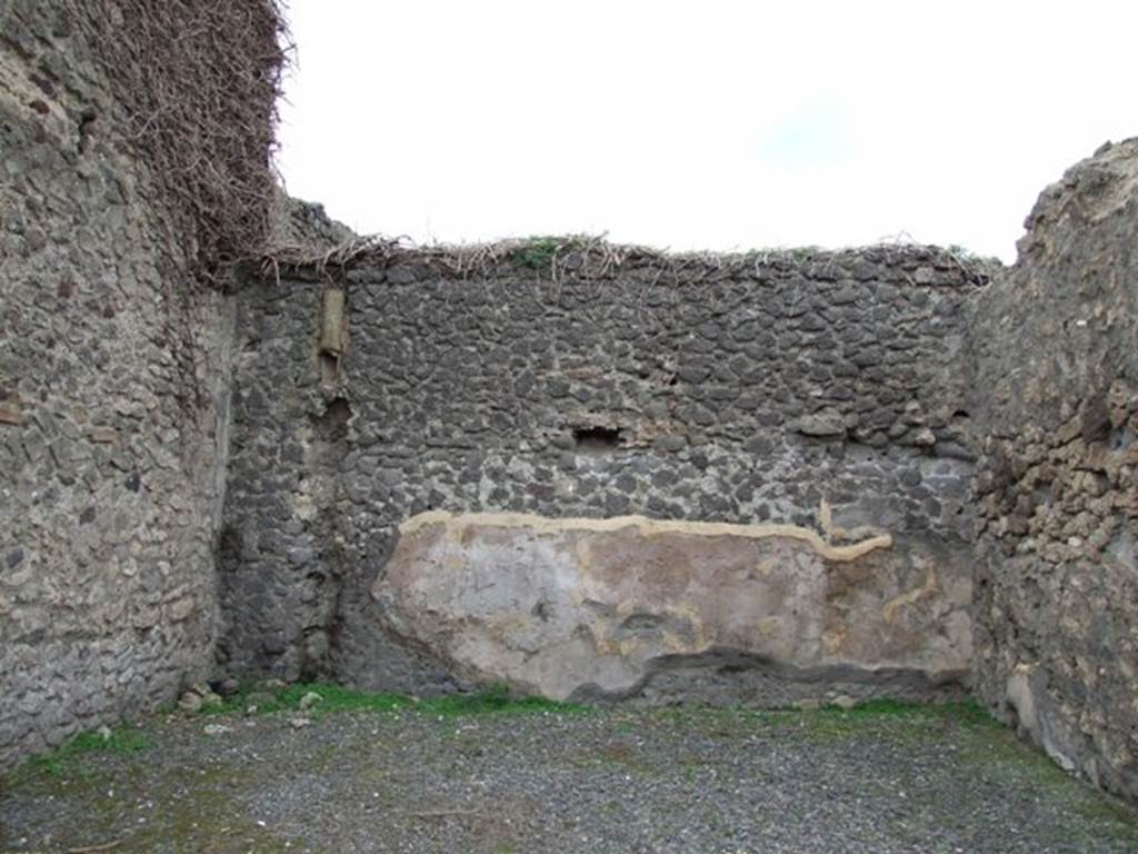 VIII.5.33 Pompeii. Shop. December 2007. West wall with waste pipe from upper floor, possibly from a latrine?