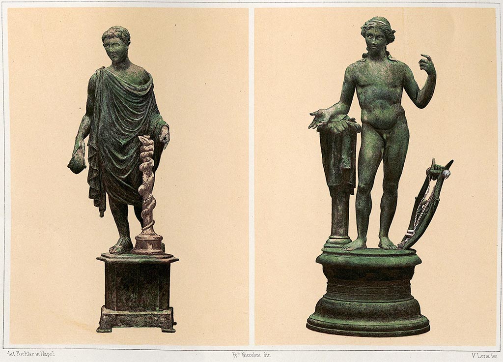 VIII.5.37 Pompeii. Bronze statuettes of Apollo and Mercurio from the lararium in the atrium.
According to Niccolini – Mercury was later transformed into Aesculapius with the addition of a stick, which envelops the serpent.
See Niccolini F, 1896. Le case ed i monumenti di Pompei: Volume Quarto. Napoli, Supplemento Tav. VII.