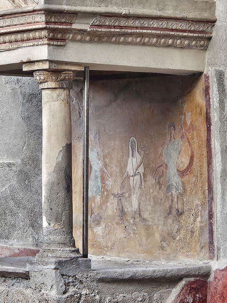 VIII.5.37 Pompeii. November 2024.
Room 1, detail of south side of lararium on east side of atrium. Photo courtesy of Annette Haug.