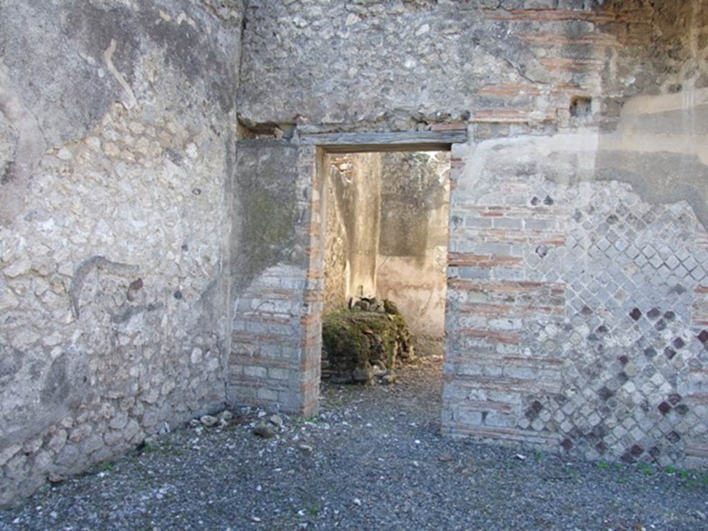 VIII.5.37 Pompeii. March 2009. Doorway to Room 15. Kitchen, in south west corner of atrium.