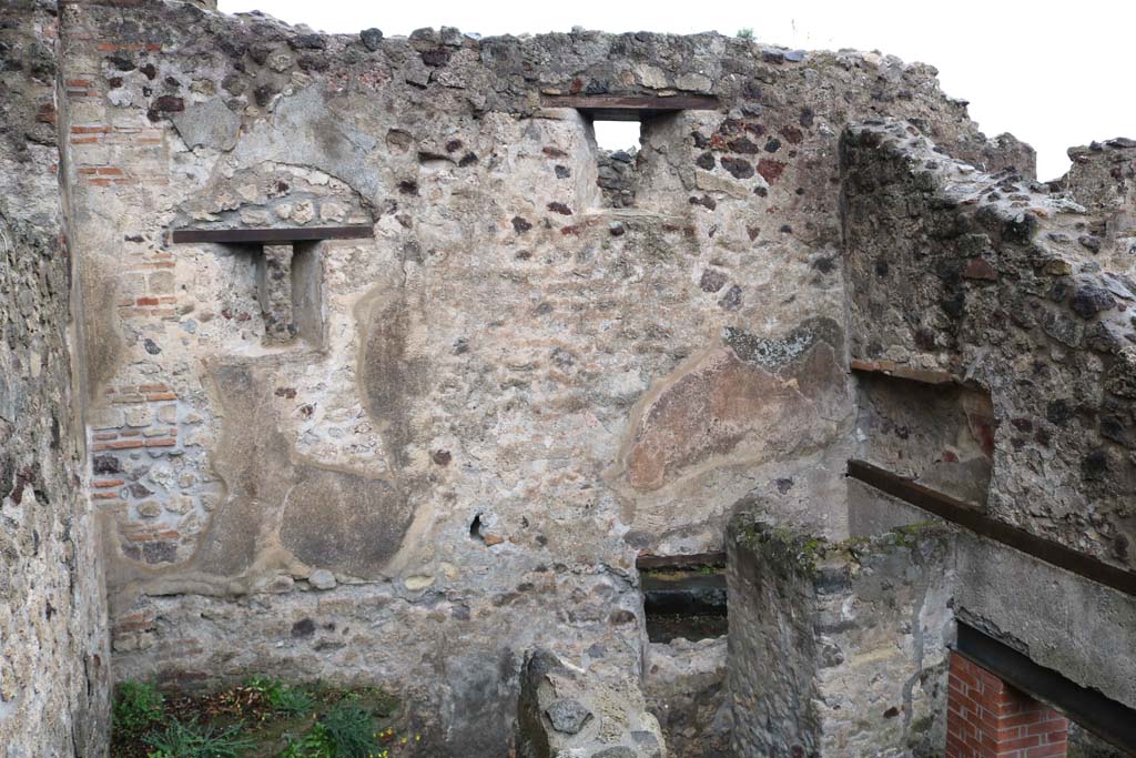 VIII.6.10, Pompeii. December 2018. Looking north in room “u”, stairs to lower floor, in north-west corner of peristyle area, on left.
Room “t”, a cubiculum with recess in the east wall and a small window in the north wall, is on the right (without a floor).
Photo courtesy of Aude Durand.