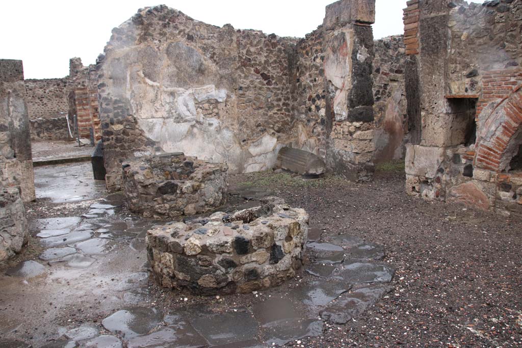 VIII.6.11 Pompeii. October 2020.
Looking north towards doorway to room “k” and peristyle area, on left, and doorway to room “e” in north-east corner of bakery room.
Photo courtesy of Klaus Heese.