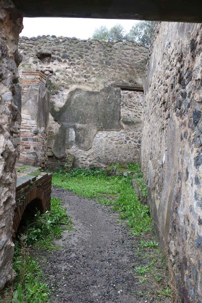 VIII.6.11, Pompeii. December 2018.
Looking west through doorway into kitchen. Photo courtesy of Aude Durand.