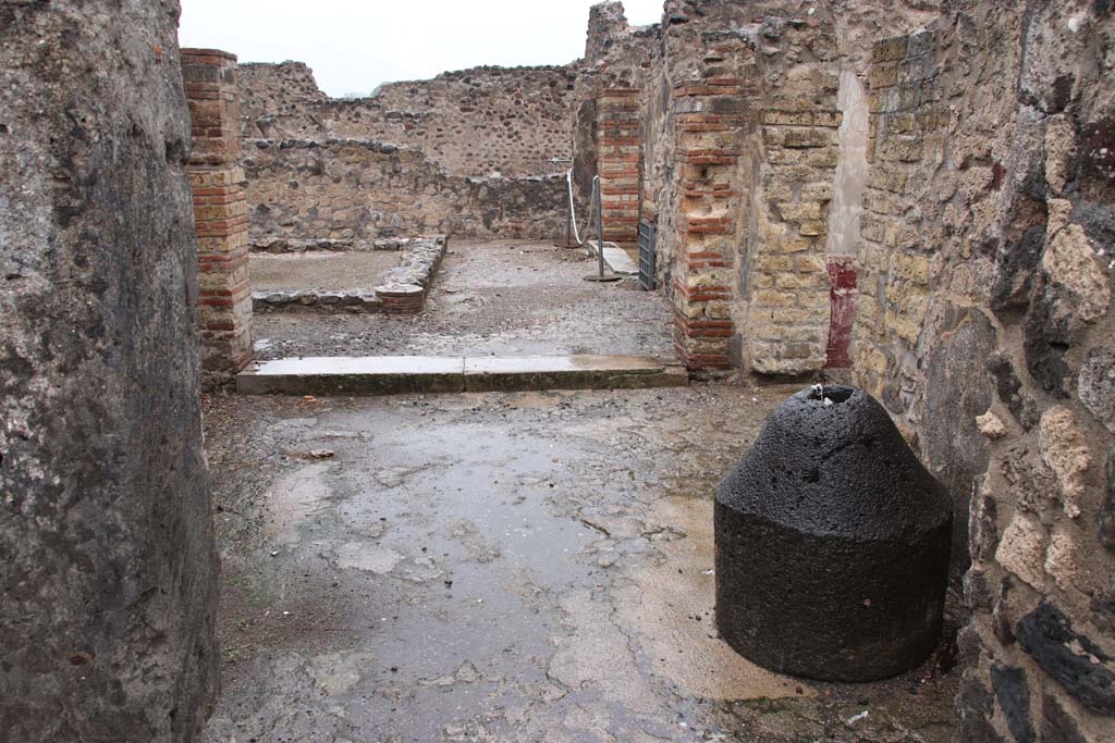 VIII.6.11 Pompeii. October 2020. Looking north through doorway from bakery room across room K, towards rooms around peristyle.
Photo courtesy of Klaus Heese