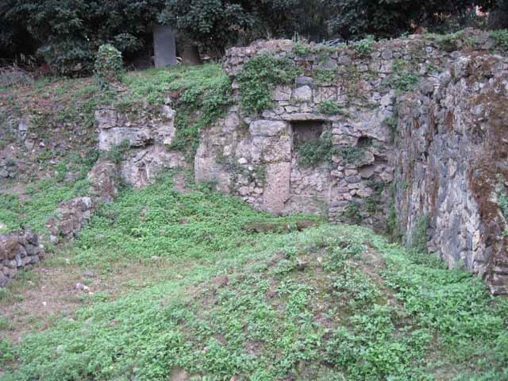 VIII.7.1 Pompeii. September 2010. Looking south across site of garden area and city wall with blocked doorway that used to lead to the agger or the pomerium. Photo courtesy of Drew Baker.
