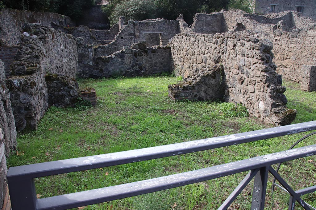 VIII.7.3 Pompeii. October 2024. Looking west across shop and rear room. Photo courtesy of Klaus Heese.