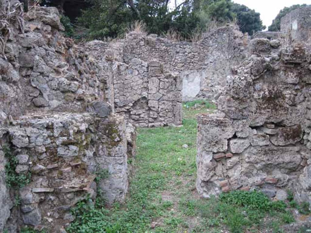VIII.7.5 Pompeii. September 2010. Looking west towards atrium of VIII.7.6 and rear, from room on north side of entrance. Photo courtesy of Drew Baker.