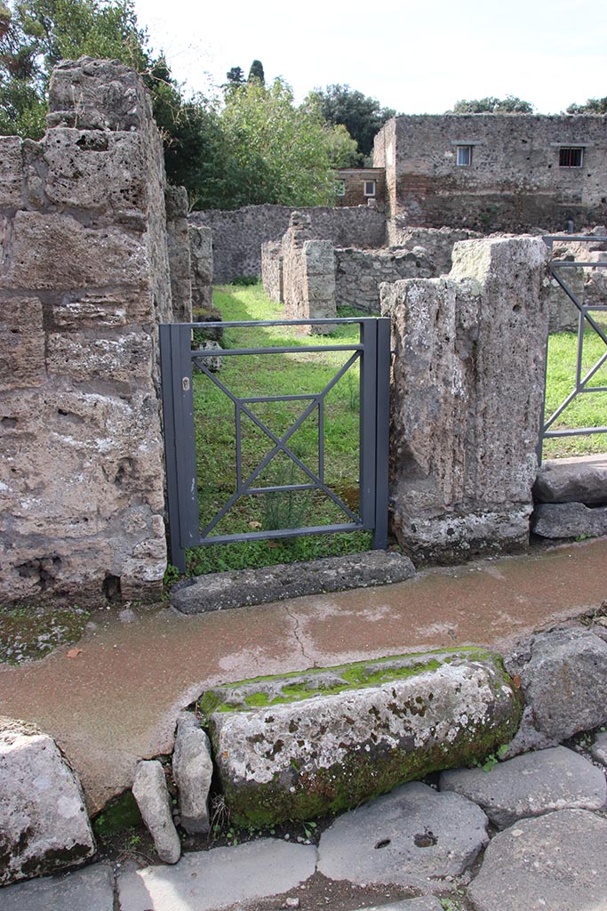 VIII.7.7 Pompeii. October 2024.
Entrance doorway to steps to upper floor. Photo courtesy of Klaus Heese.