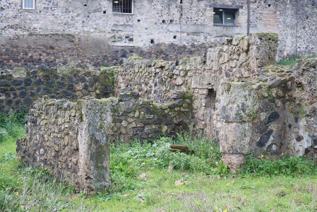 VIII.7.10 Pompeii. December 2018.
Looking towards rear room of shop-room, with a niche/recess in the north wall? Photo courtesy of Aude Durand.