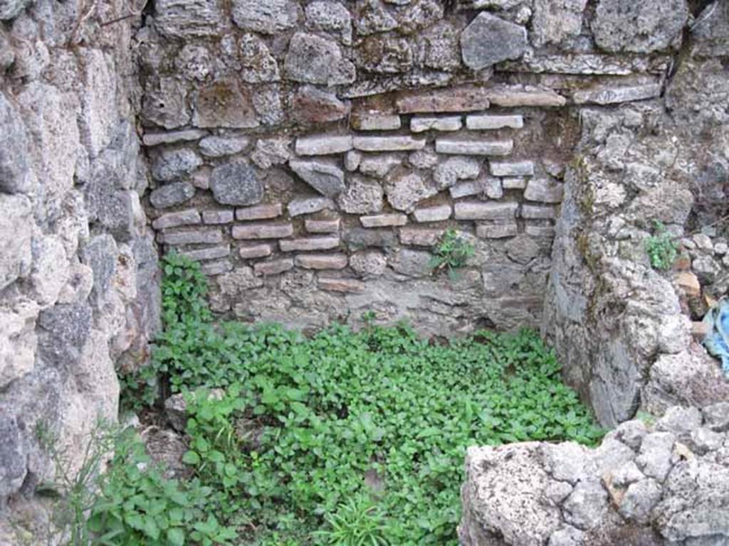 VIII.7.10 Pompeii. September 2010. Site of kitchen, described by Eschebach as having hearth, well and lararium. See Eschebach, L., 1993. Gebäudeverzeichnis und Stadtplan der antiken Stadt Pompeji. Köln: Böhlau. (p. 389)
According to Boyce, in the wall of the kitchen there was a niche and beside it was a lararium painting. It represented a sacrificial scene with the Genius and the tibicen, one on each side of an altar. On either side of them was a Lar. In the lower zone was a single serpent beside and altar.
See Boyce G. K., 1937. Corpus of the Lararia of Pompeii. Rome: MAAR 14. (p.78, no.377)
See Sogliano, A., 1879. Le pitture murali campane scoverte negli anni 1867-79. Napoli: (p.12, no.24, “badly preserved”)