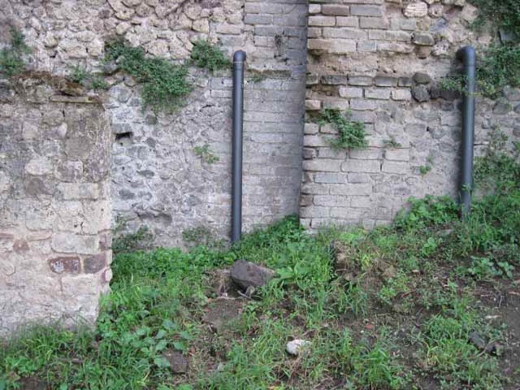 VIII.7.10 Pompeii. September 2010. Rear of garden area, site of latrine? Looking west towards rear wall of VIII.7.16 Photo courtesy of Drew Baker.