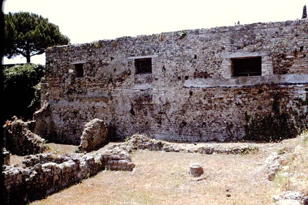 VIII.7.12 Pompeii. 1966.
Garden area at rear, looking west towards base of column in wide entrance of room at rear. Photo by Stanley A. Jashemski.
Source: The Wilhelmina and Stanley A. Jashemski archive in the University of Maryland Library, Special Collections (See collection page) and made available under the Creative Commons Attribution-Non Commercial License v.4. See Licence and use details.
J66f0203
According to PARP:PS – there was a hearth/cooking facilities (no.6 on their plan) against the north wall in the rear area.
The remains of this can be seen on the right of the above photo.