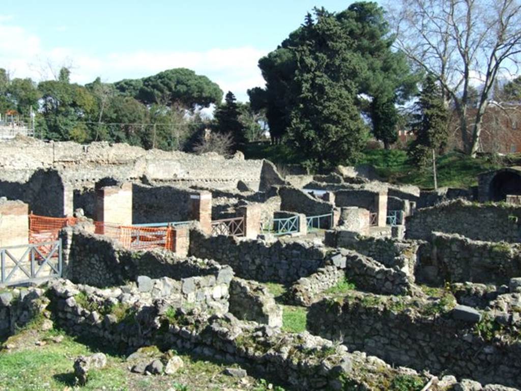 VIII.7.12 Pompeii. March 2009. Looking south-east towards front entrances of VIII.7.13 and 12. From rear.