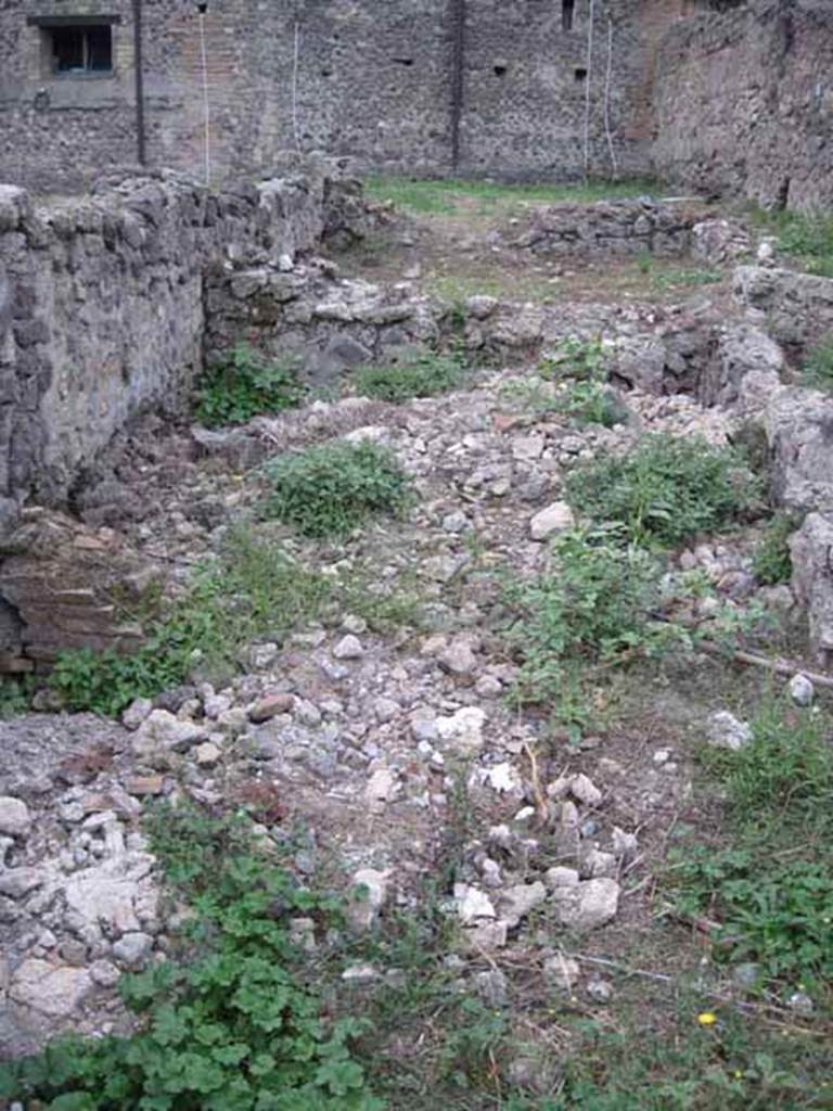 VIII.7.15 Pompeii. September 2010. Rear rooms and corridor including kitchen area (on right). Looking west across rear room of shop and triclinium at the rear. Photo courtesy of Drew Baker.