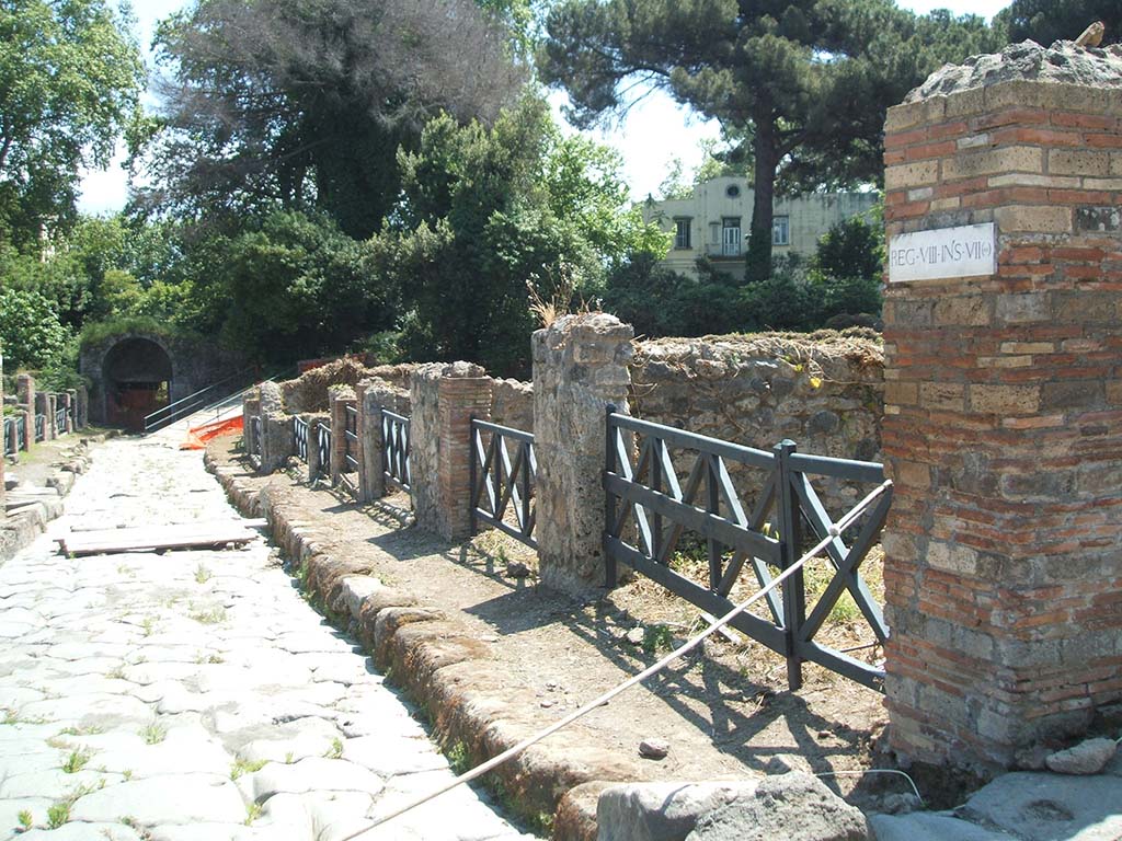 VIII.7.15 Pompeii. May 2005. Via Stabiana looking south across VIII.7 to Stabian Gate. VIII.7.15 on right.