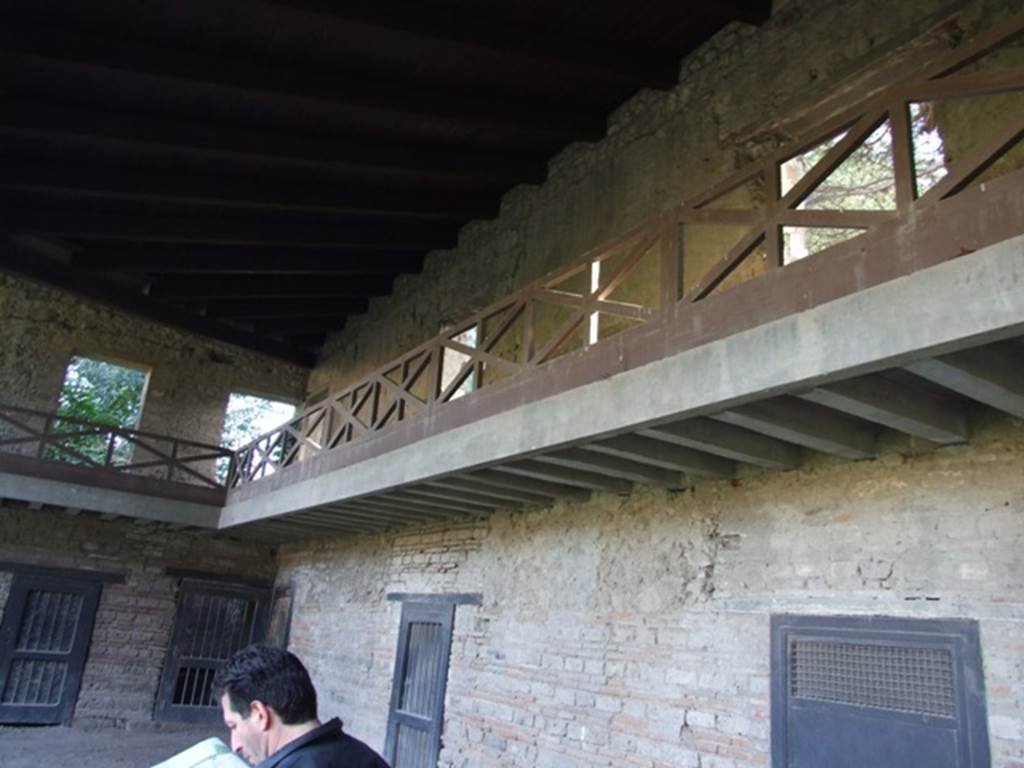 VIII.7.16 Pompeii. December 2007. Looking east along south side showing upper storey rooms and gallery in south east corner.
