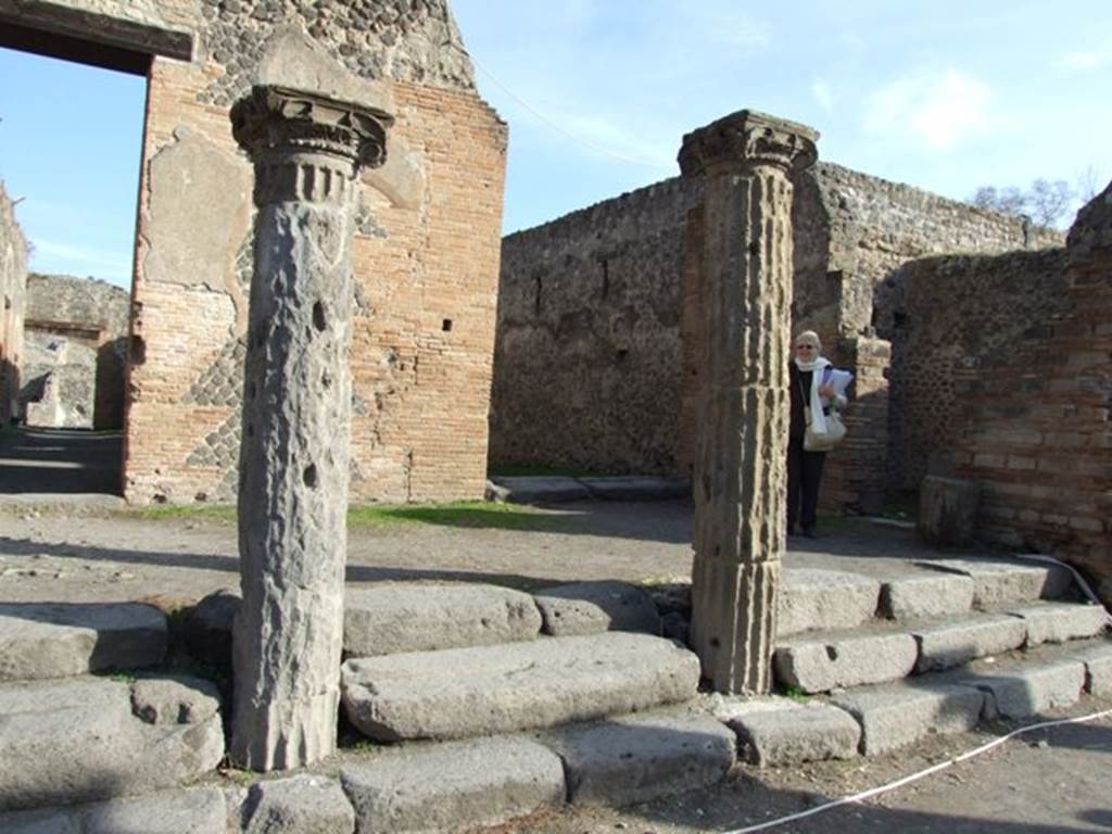 VIII.7.16 Pompeii. December 2007. Looking east in north-east corner showing, left to right, - the ends of corridors from entrances VIII.7.17 and VIII.7.16, and the doorway to doorkeeper’s room.