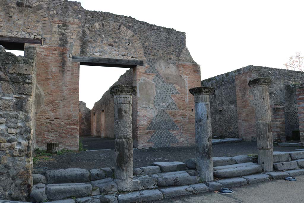 VIII.7.17 Pompeii, centre left, and VIII.7.16, on right. December 2018.
Looking east from north-east corner of Gladiators’ Barracks. Photo courtesy of Aude Durand.