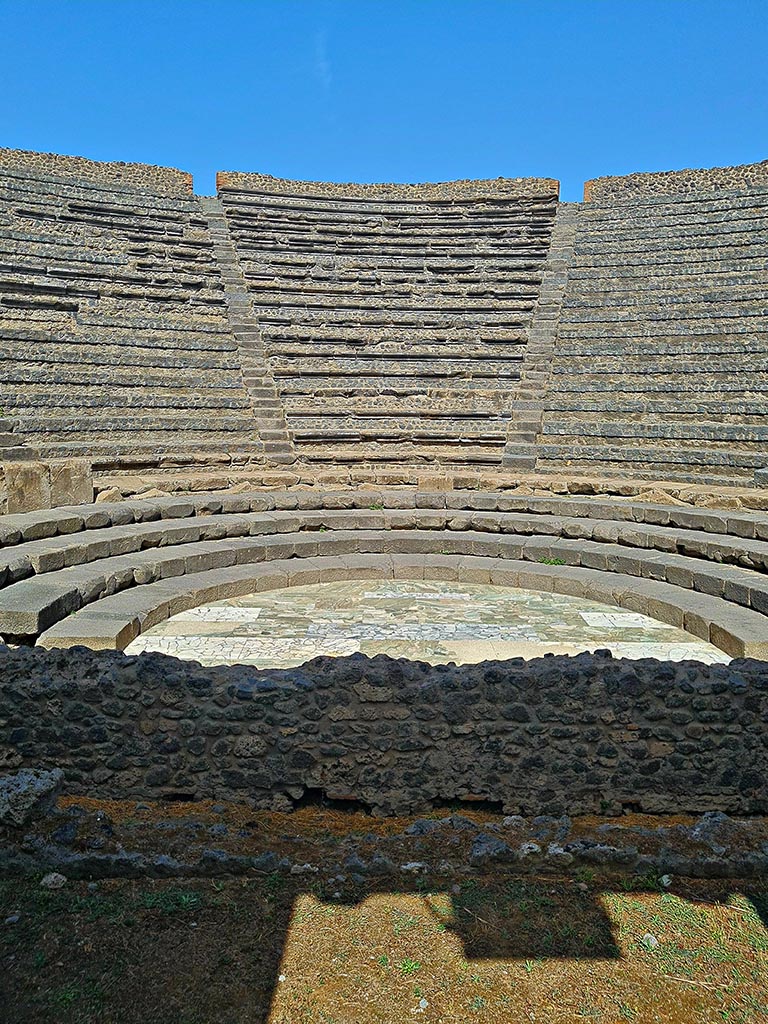 VIII.7.19/18 Pompeii. September 2024.
Looking towards seating on north side, from stage. Photo courtesy of Giuseppe Ciaramella.