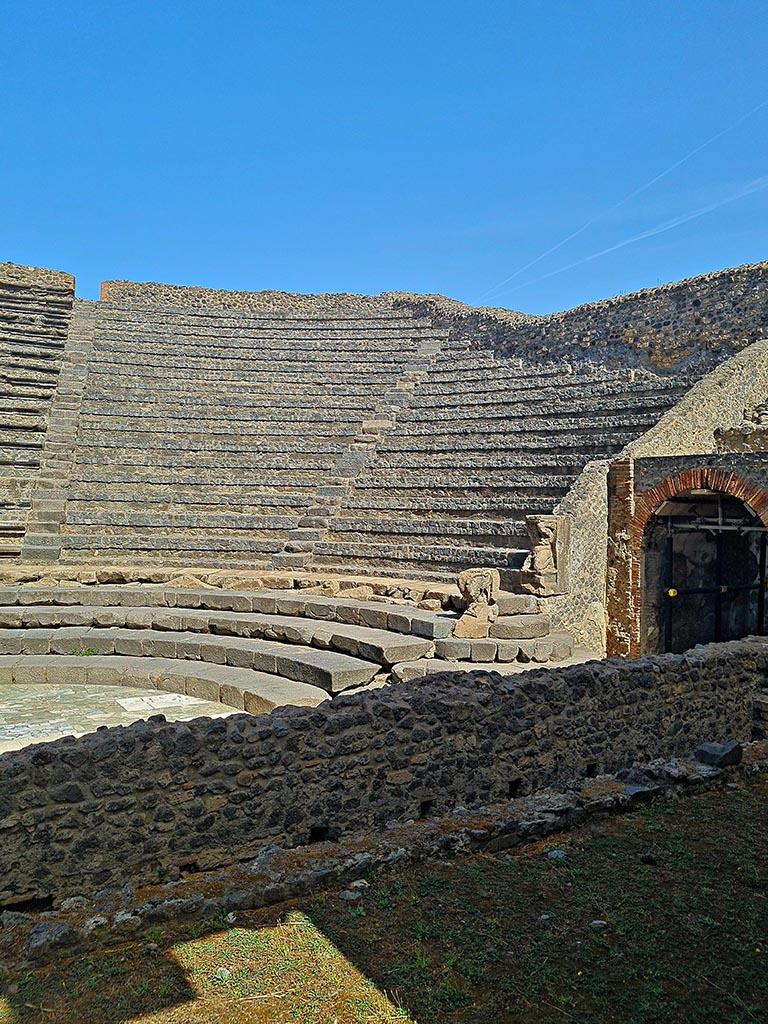 VIII.7.19/18 Pompeii. September 2024.
Looking towards seating on east side, from stage. Photo courtesy of Giuseppe Ciaramella.