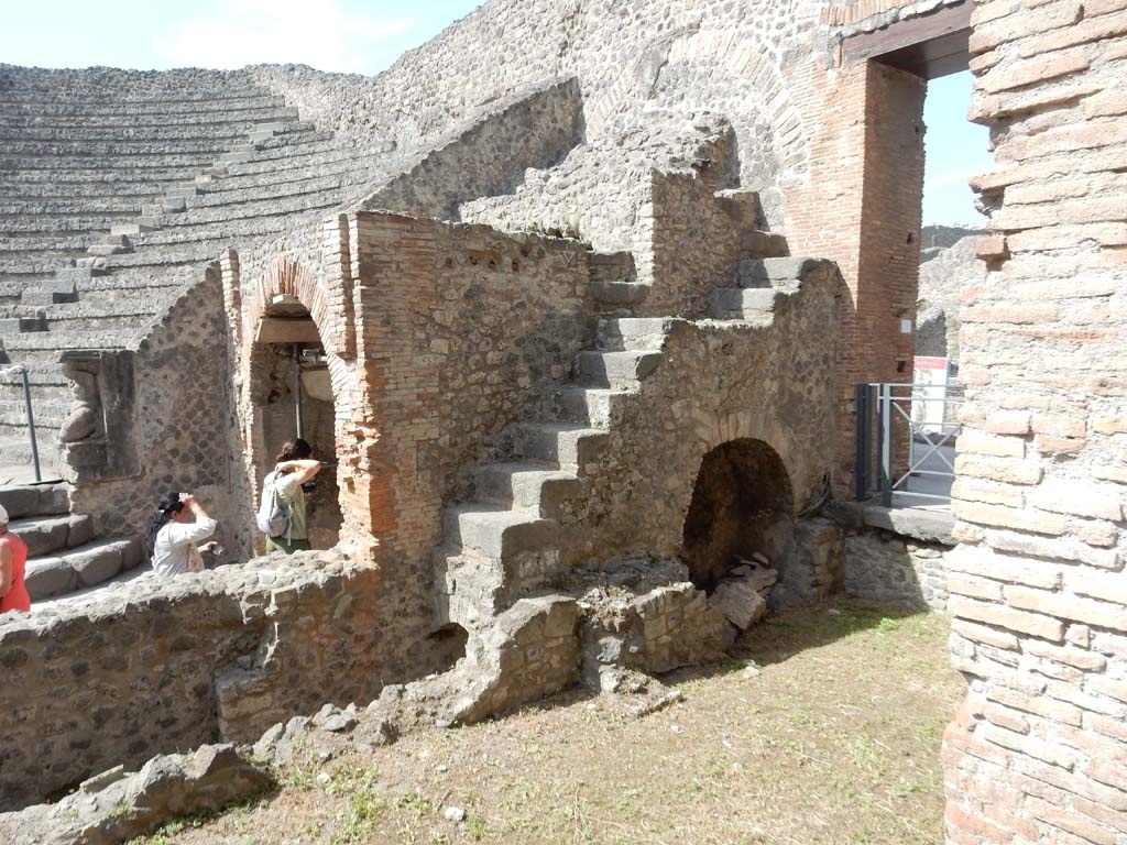 VIII.7.19 Pompeii. June 2019.
Small narrow steps leading to seating for the honoured guests, looking towards east side of Little Theatre.
Photo courtesy of Buzz Ferebee.