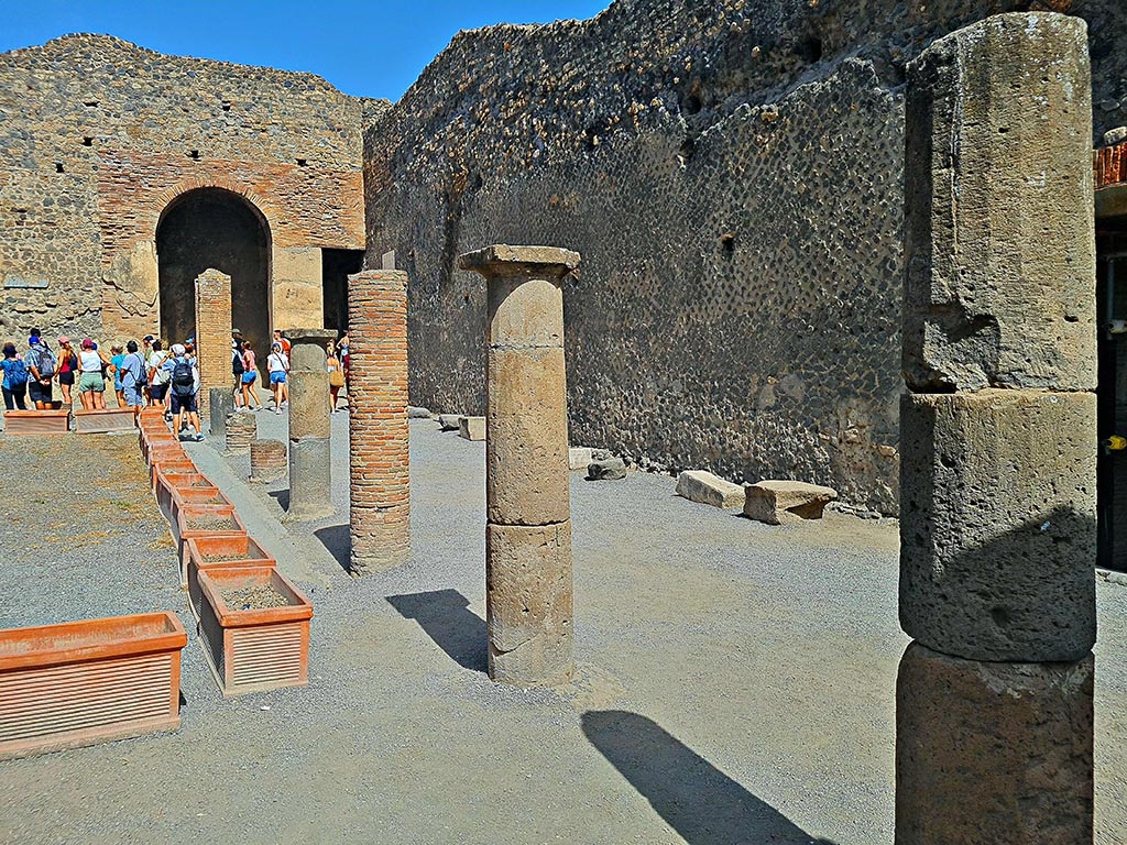 VIII.7.19 Pompeii. September 2024. Looking north-east.
Exit/entrance to Little Theatre at west end, on right, on east end of Large Theatre. Photo courtesy of Giuseppe Ciaramella.