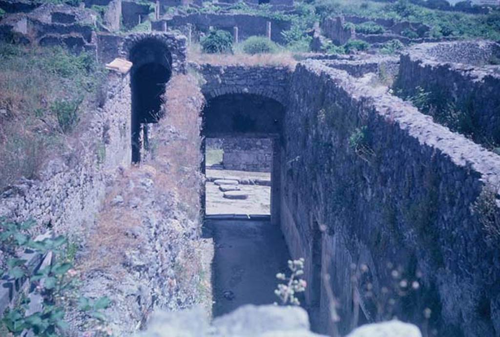 VIII.7.21 Pompeii (on left) and VIII.7.20 (centre). June 1962.
Looking east from entrance corridors towards Reg. 1, insula 3. Photo courtesy of Rick Bauer.