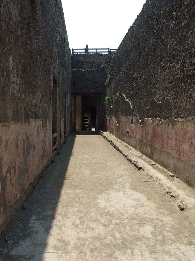 VIII.7.20 Pompeii. May 2006. Entrance corridor to Large Theatre.
On the left can be seen the entrances to the steps at the rear of the Little Theatre or Odeon.