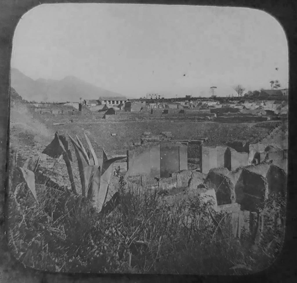 VIII.7.20 Pompeii. c.1900. C. and G. Lantern slide published by A. Laverne.
Looking north-east from steps leading to Triangular Forum, towards Large Theatre.