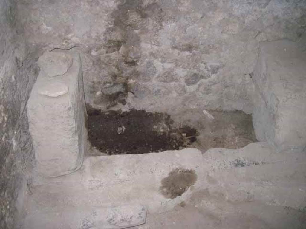 VIII.7.21 Pompeii. September 2010. Latrine #1 on left hand side on east wall. Orientation east towards theatre. Photo courtesy of Drew Baker.