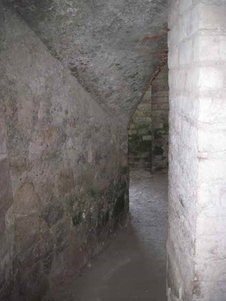 VIII.7.21 Pompeii. September 2010. View of the entrance to the latrine from the latrine into the pre-theatre area. Orientation looking north towards the water tank and Samnite Palaestra. Photo courtesy of Drew Baker.