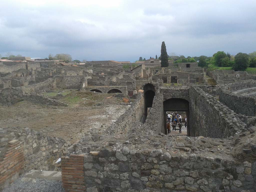 VIII.7.21 Pompeii (on left) and VIII.7.20 (on right). April 2014. Looking east across upper level of entrance corridors.
Looking east across top of Via Stabiana towards Reg. I. Photo courtesy of Klaus Heese.