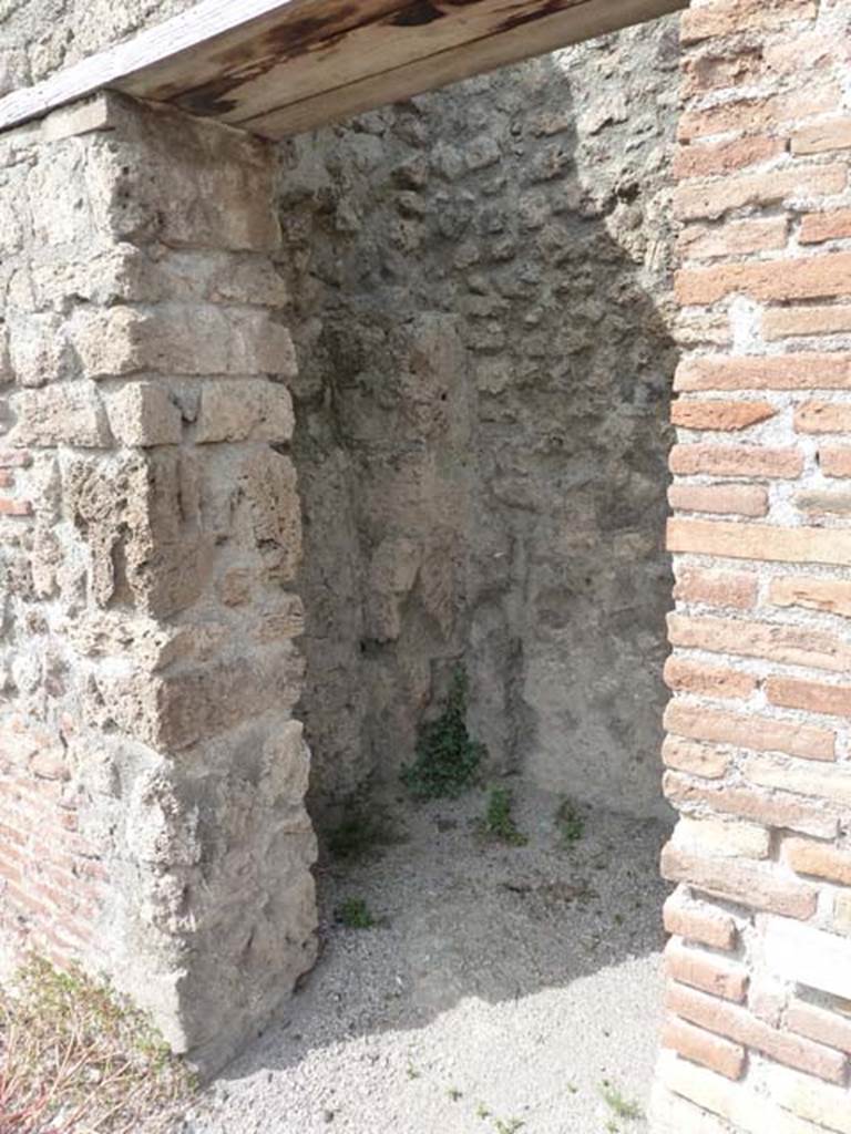 VIII.7.23 Pompeii. September 2015. Doorway to small room or latrine. Looking north-west.