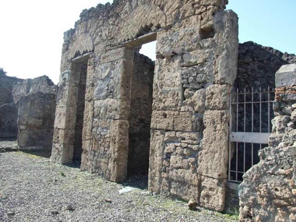 VIII.7.24 Pompeii. March 2009. Doorways to Rooms on north side of atrium.