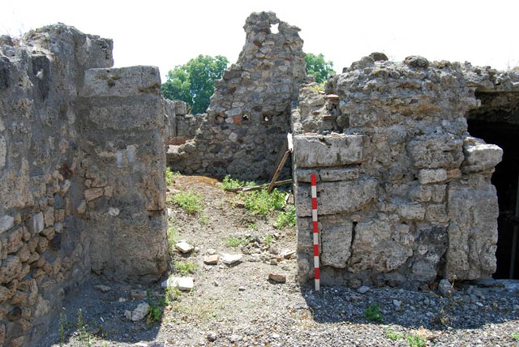 VIII.7.24 Pompeii. June 2009. Doorway to first room on south side of atrium. Photo courtesy of Sera Baker.