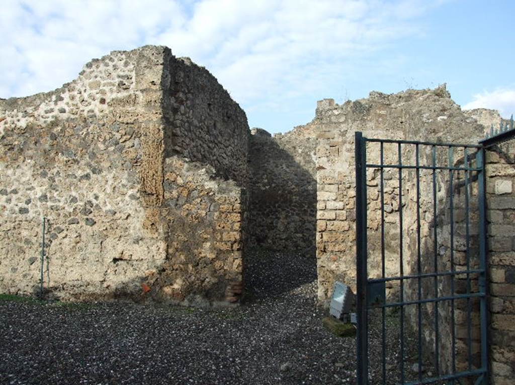 VIII.7.25 Pompeii. December 2006. Doorway to Room for the priest on north side of entrance.