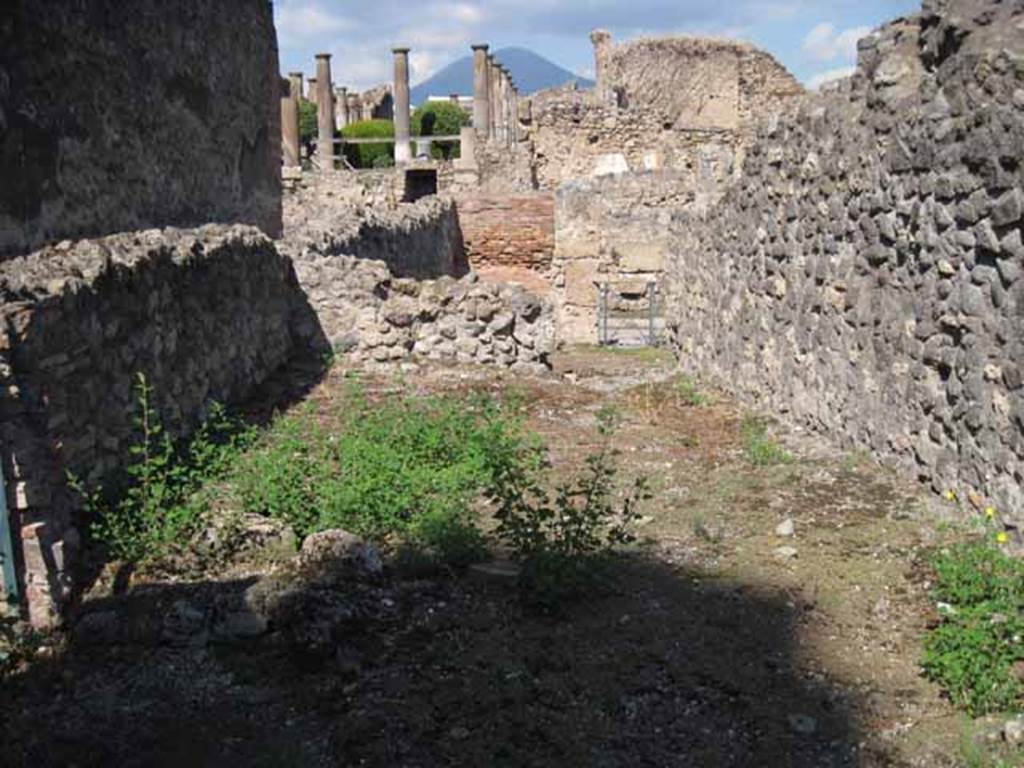 VIII.7.26 Pompeii. September 2010. Looking north across room behind main entrance room, towards Via del Tempio d’Iside. Entrance 27A on left of image, enters from the alleyway leading from the theatre. Photo courtesy of Drew Baker.
