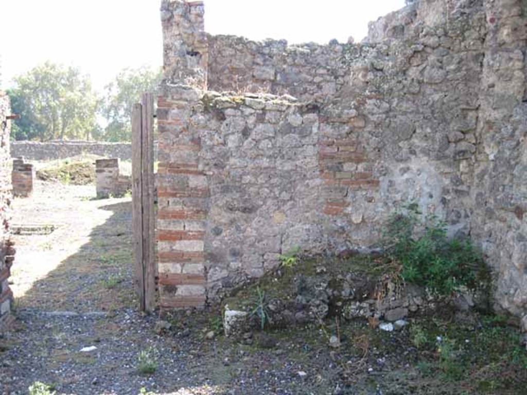 VIII.7.26 Pompeii. September 2010. South wall of room, looking south into atrium. Photo courtesy of Drew Baker.
According to the plan by W. Gell (see Part 2) the structure remaining, on the right, would have been another stairs to upper floor.