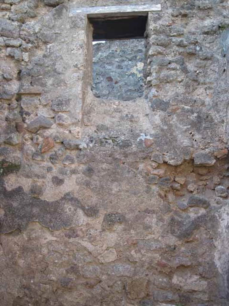 VIII.7.26 Pompeii. September 2010. West wall with window onto small alleyway. Photo courtesy of Drew Baker.