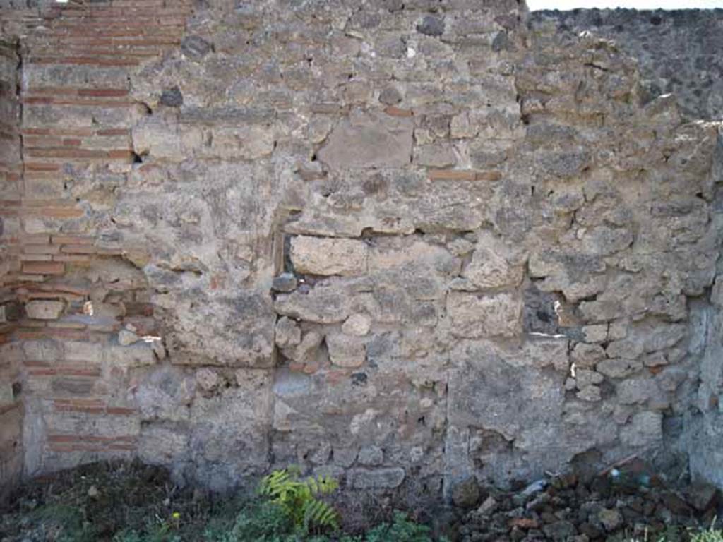 VIII.7.26 Pompeii. September 2010. West wall of tablinum with blocked doorway. Looking west. Photo courtesy of Drew Baker.