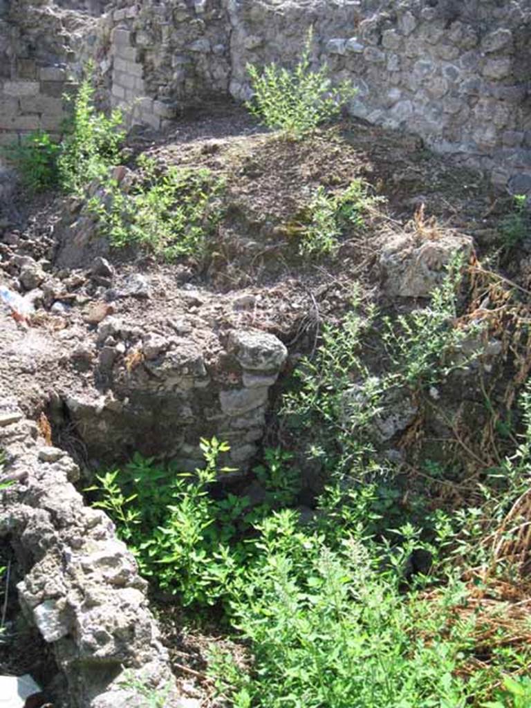 VIII.7.26 Pompeii. September 2010. Site of kitchen room, remains of south wall?. Photo courtesy of Drew Baker.