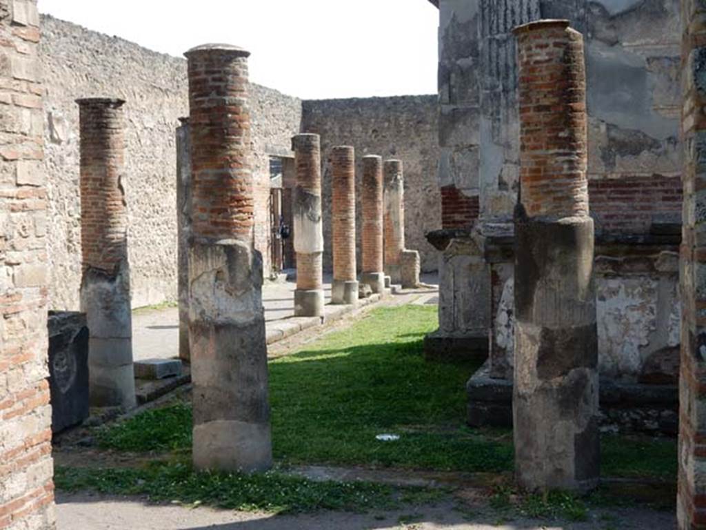 VIII.7.28, Pompeii. May 2015. Looking east along north portico, towards entrance doorway.
Photo courtesy of Buzz Ferebee.