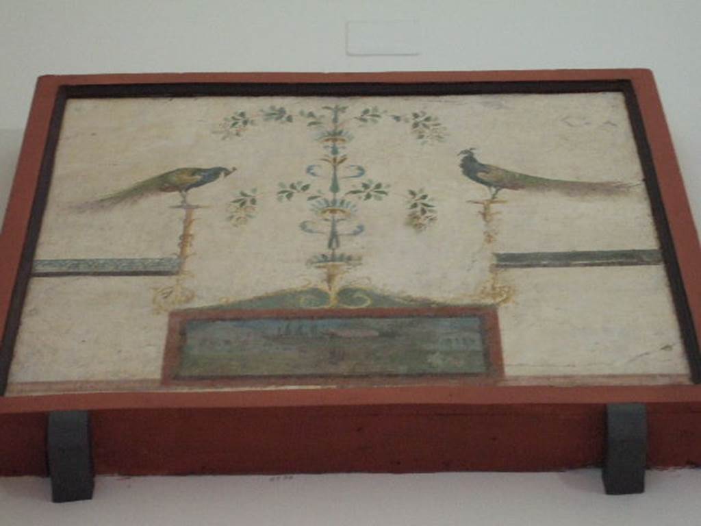 VIII.7.28 Pompeii. North part of the portico. Painting with peacocks, candelabra and landscape.
Now in Naples Archaeological Museum. Inventory number 8577.